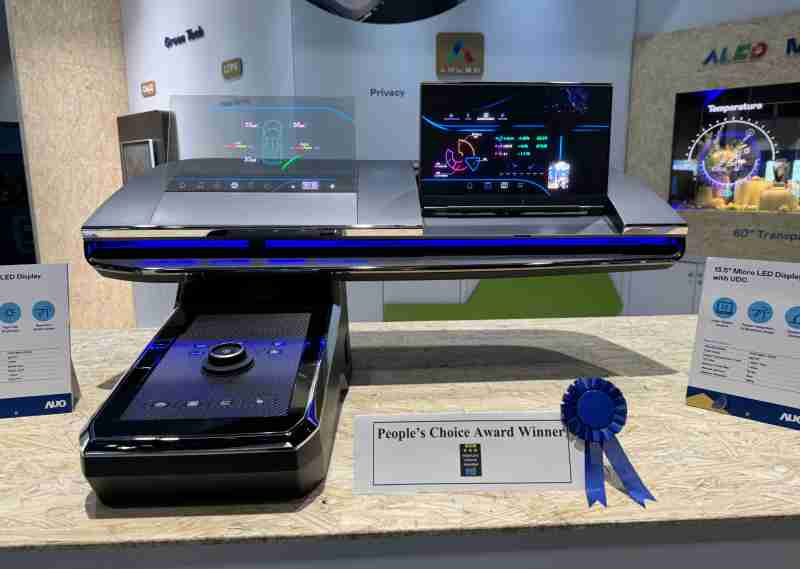 财神娱乐车用Micro LED Display HMI解决方案获”最佳车用显示奖”，，，，以用户为中心开发，，，，针对前座驾驶与乘客设计兼具娱乐与安全的高画质屏幕，，，包含车舱前座的Micro LED透明屏幕及全球首款内建镜头的智慧Micro LED显示器